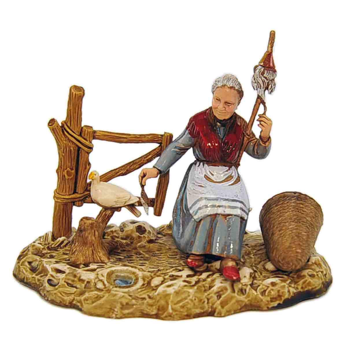 Statua cm.10 Donna Seduta che Fila con la Colomba | Moranduzzo