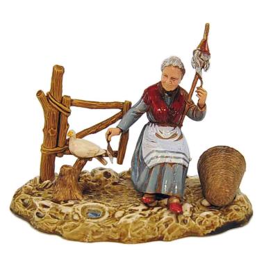 Statua cm.10 Donna Seduta che Fila con la Colomba | Moranduzzo