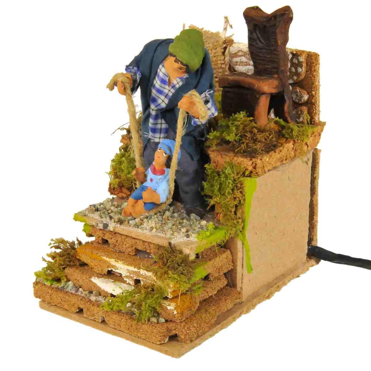 Statua con Movimento - Uomo con Bimbo cm.10 | Rossi Rosa