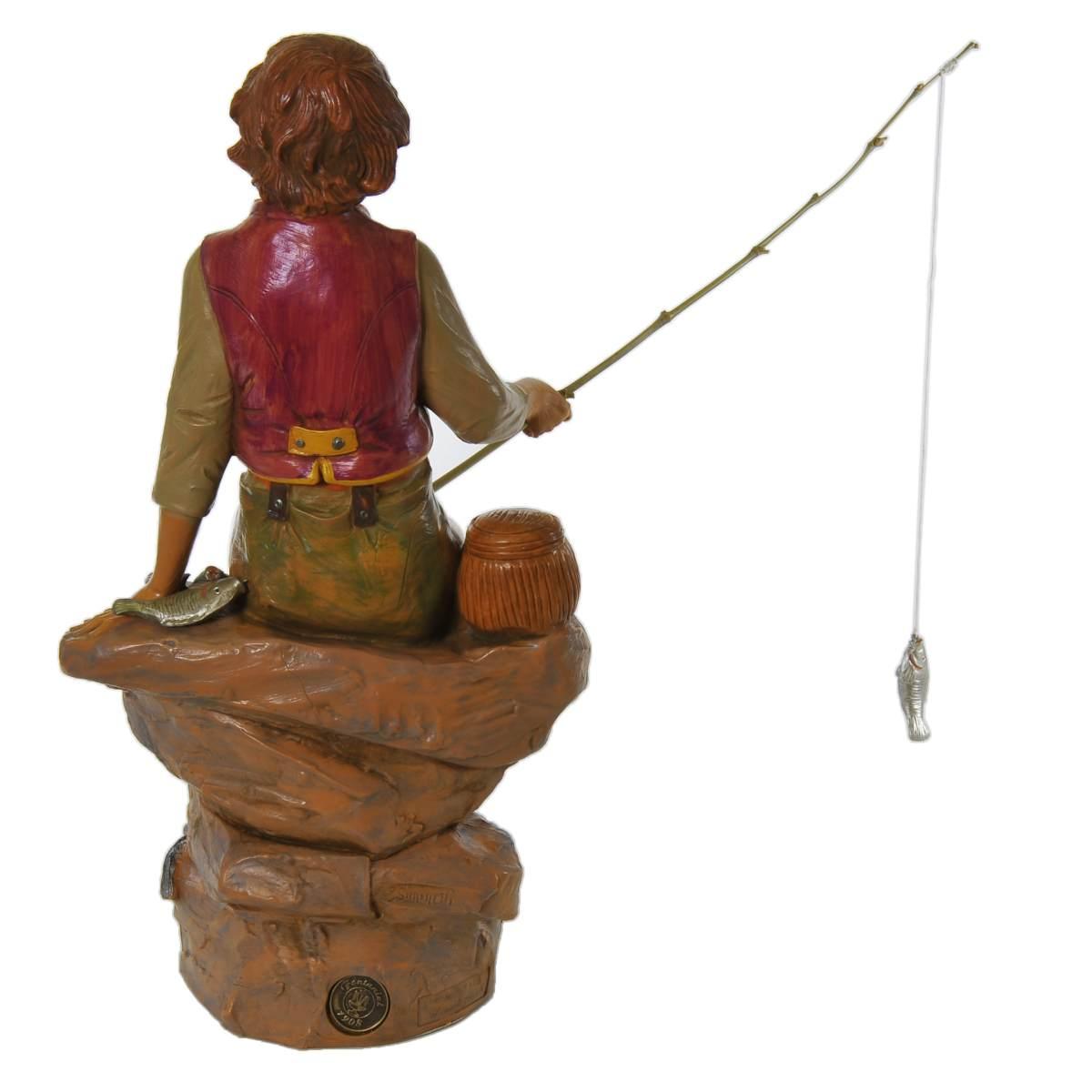 Statua presepe 30 cm pescatore seduto con canna