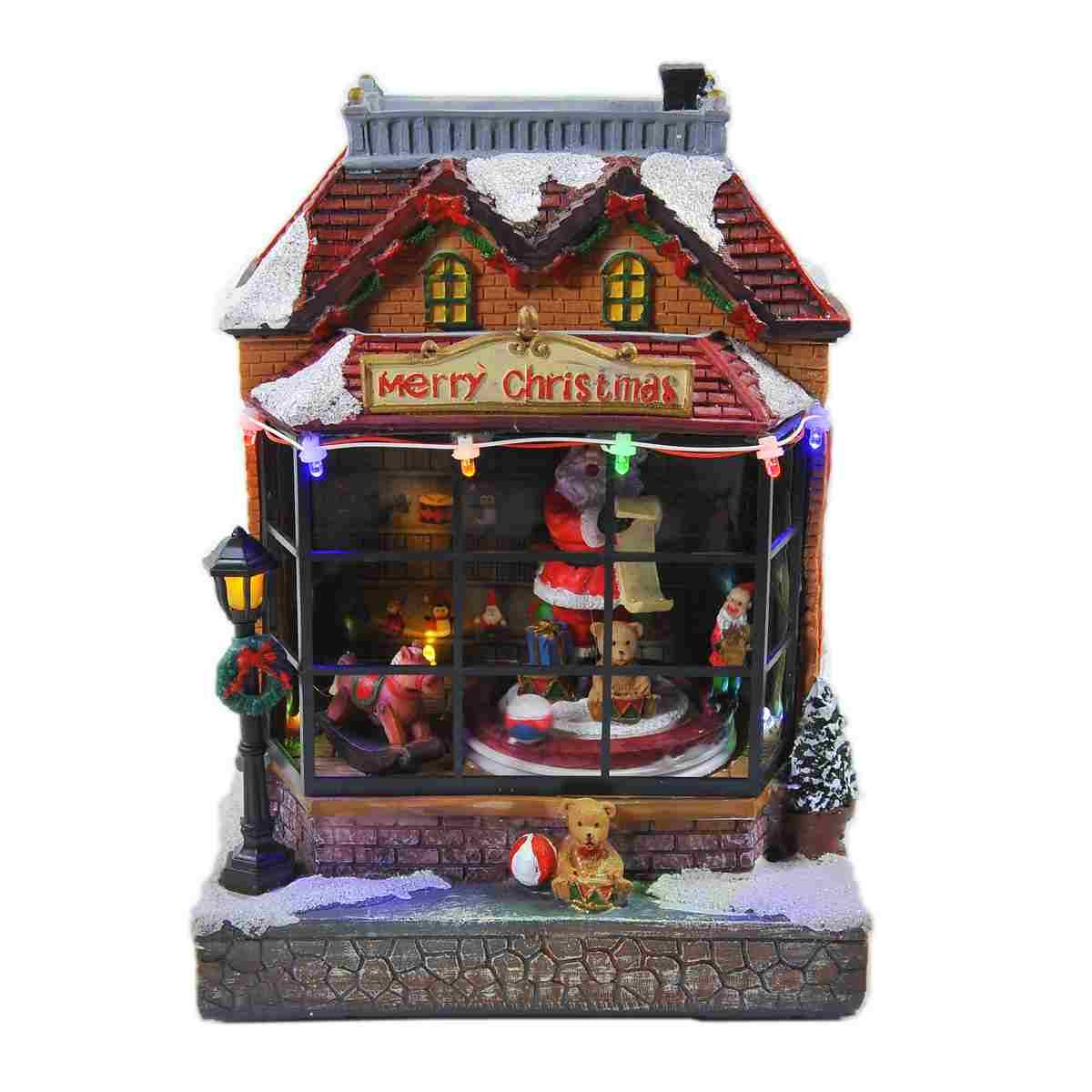 Giostra Natale Bottega con Babbo Luci Mov. Suoni a Batterie cm.17x15xh23 |Vacchetti