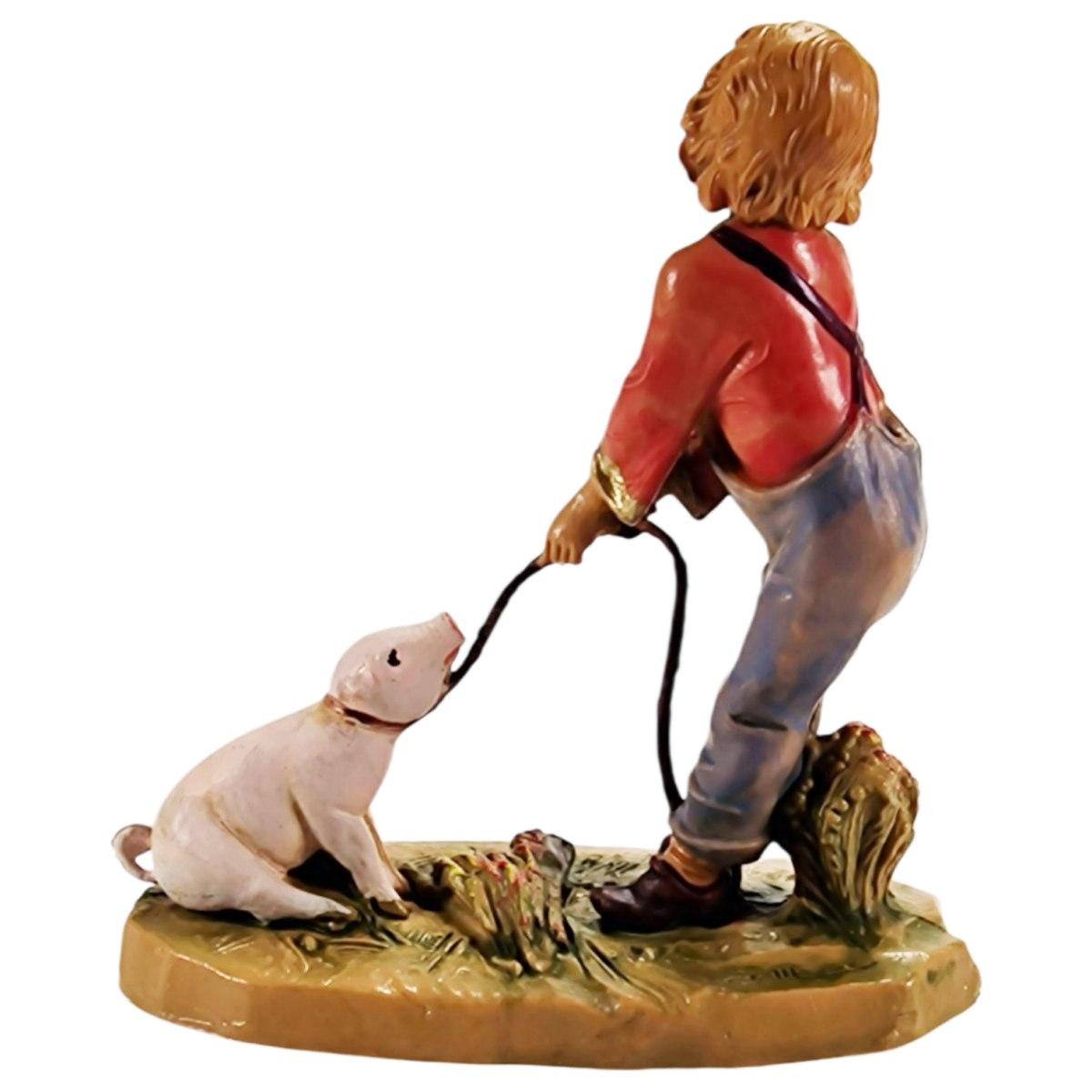 Statua presepe 12 cm bambino che tira il maiale