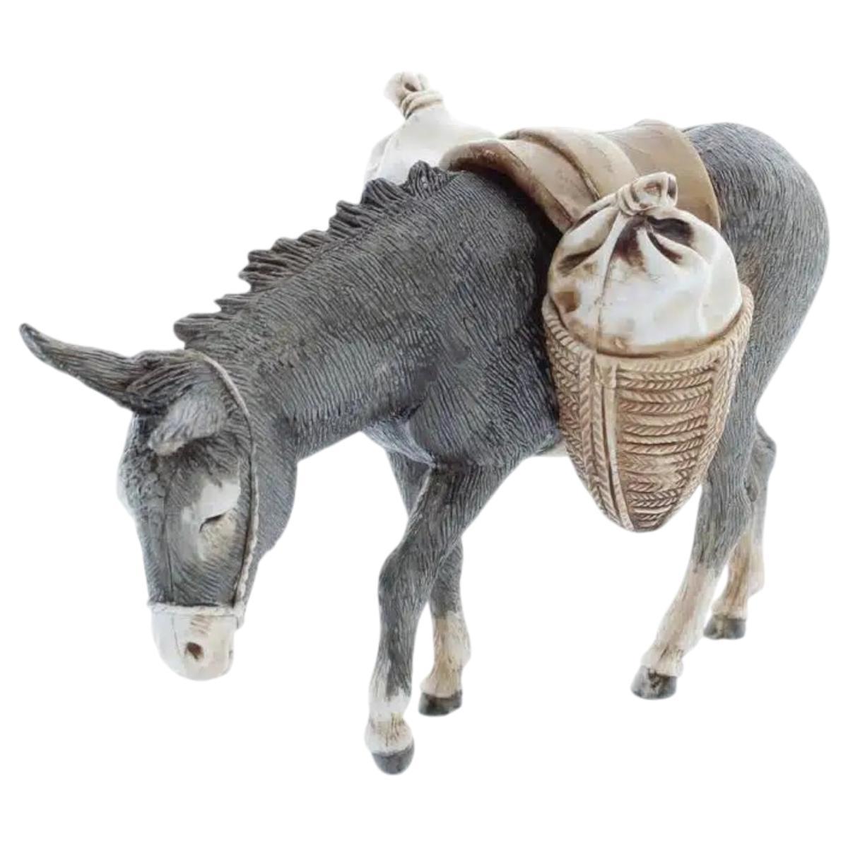 Statua presepe 13 cm asino con sella e ceste