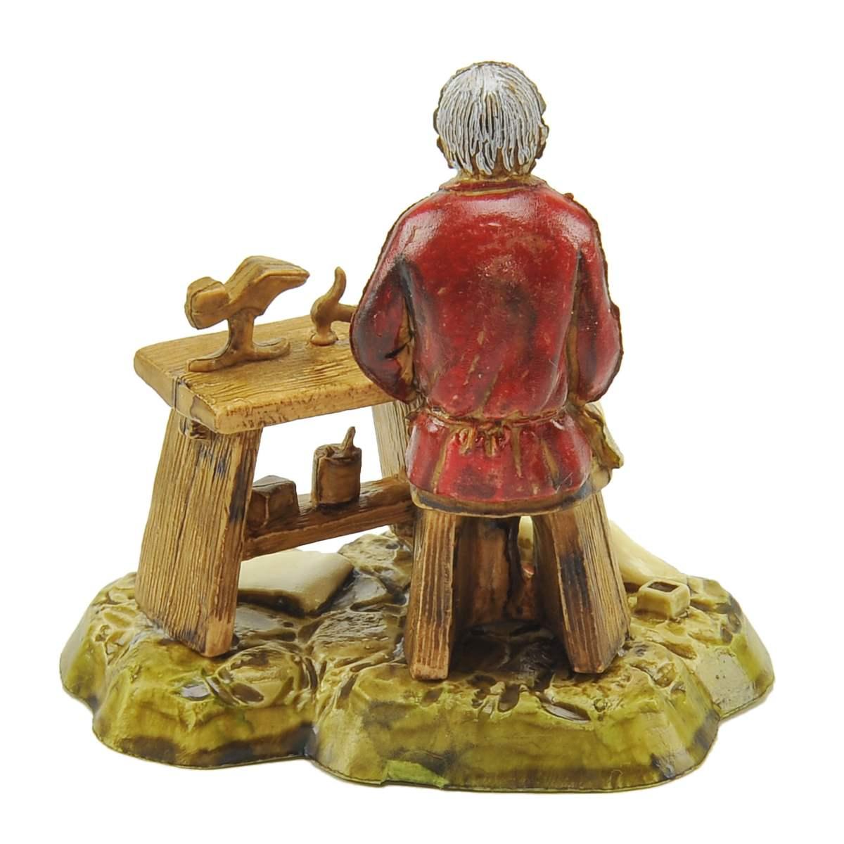 Statua presepe 10 cm ciabatino seduto al banco lavoro